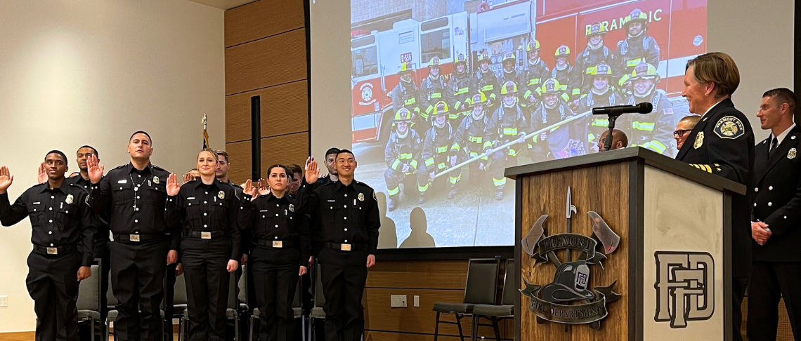 new recruits for the Fremont Fire Department being administered the Oath of Office