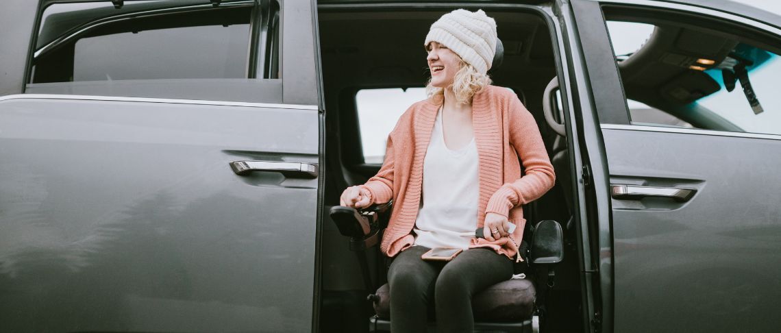 wheelchair transport with female and vehicle
