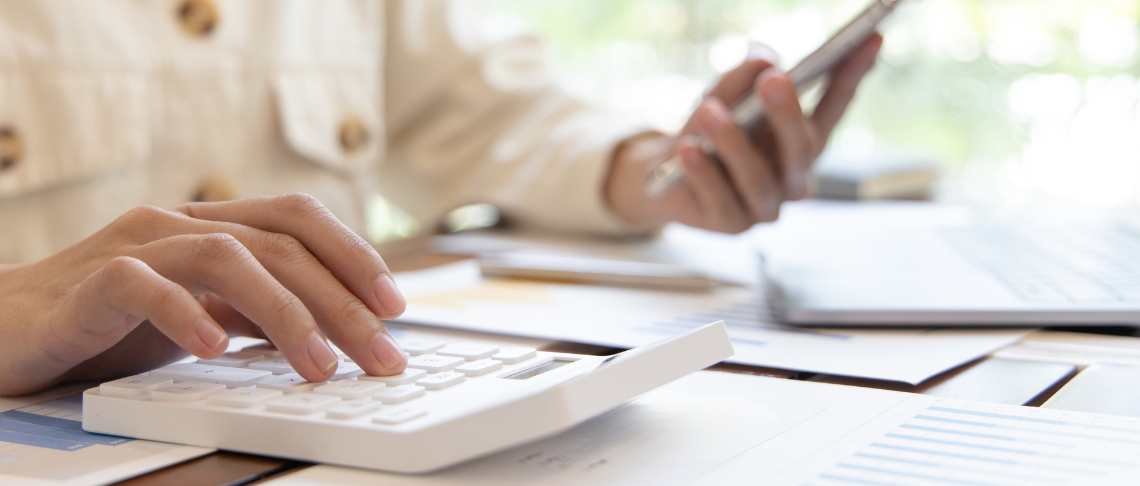 person working with a calculator