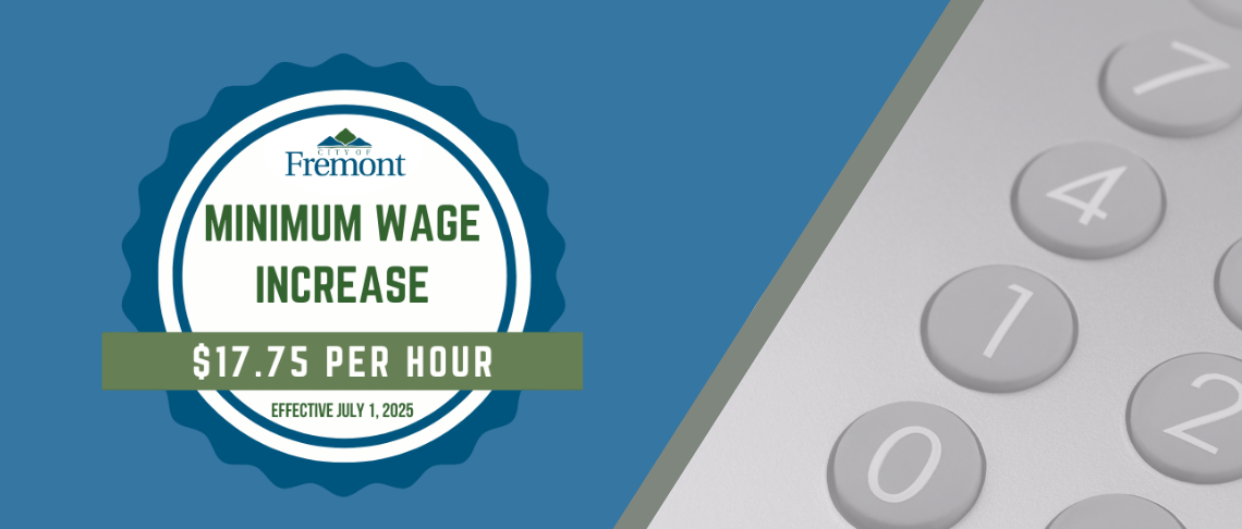 Partial view of a calculator pad with blue background. Text reads: Minimum Wage Increase $17.75 per hour effective July 1
