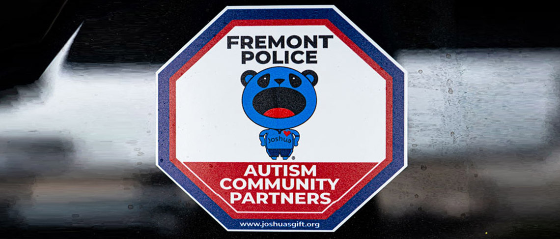 Hexagonal sticker with image of blue panda with text that reads: Fremont Police Autism Community Partners