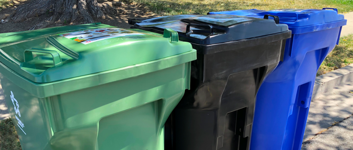 Photo of trash, recycle, and compost bins 