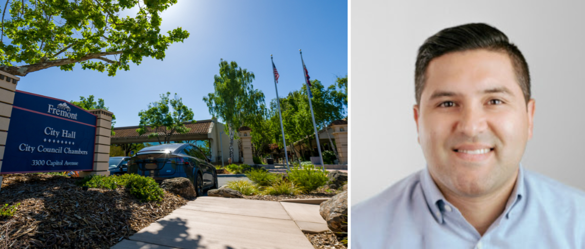 Fremont's newly appointed city clerk Alberto Quintanilla and the Fremont City Hall sign leading into parking lot