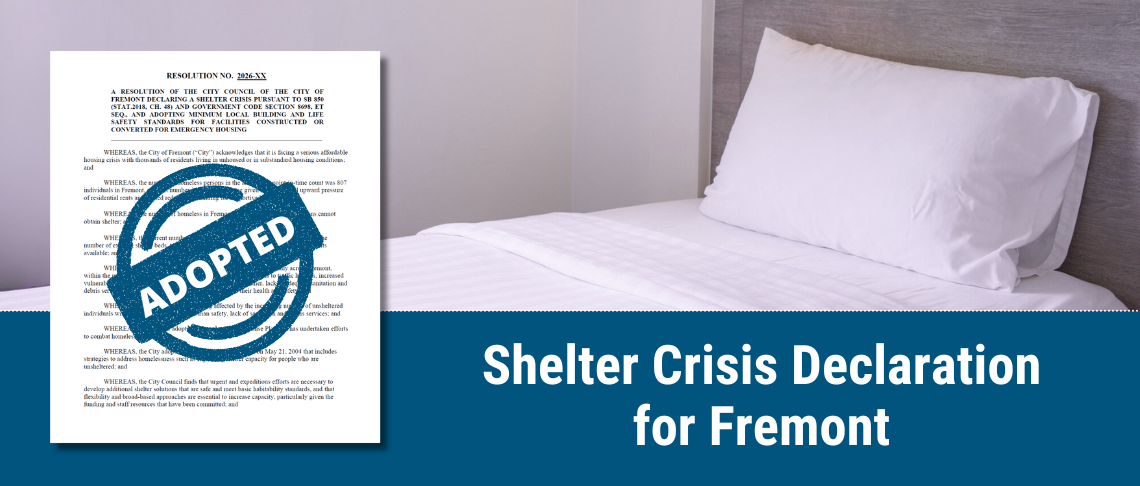 Single bed with white sheets. Text: Shelter Crisis Declaration for Fremont