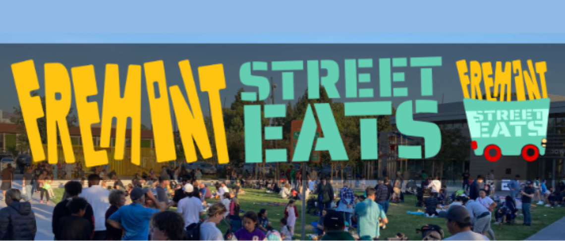 Fremont Street Eats is back. Photo of street eats words and crowd in background. 