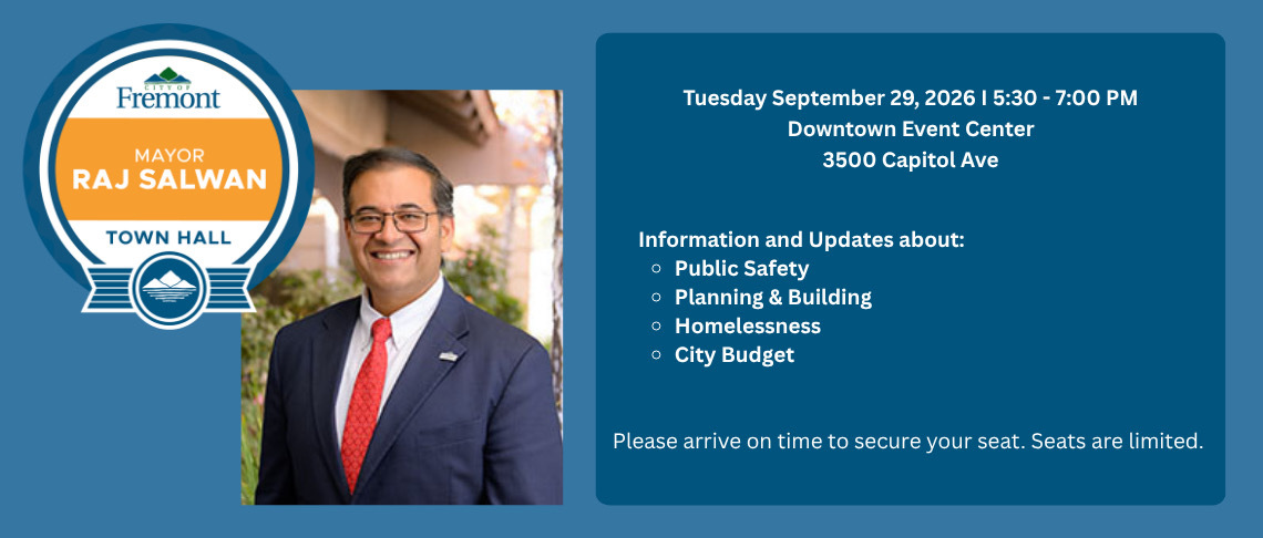 Mayor Raj Salwan smiling in a suit next to details of a town hall event on September 29, 2026.