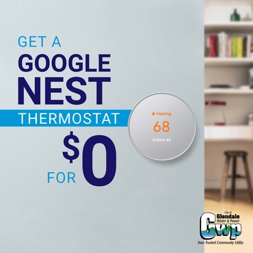 Grey wall in front of an office with Text: "Get a Google Nest Thermostat for $0"; GWP logo in right bottom corner