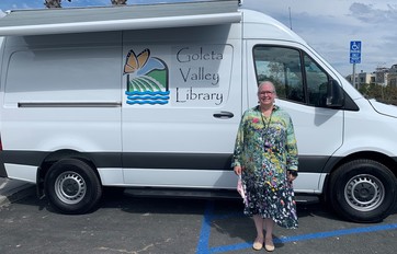 Allison Gray in front of Library Bookvan