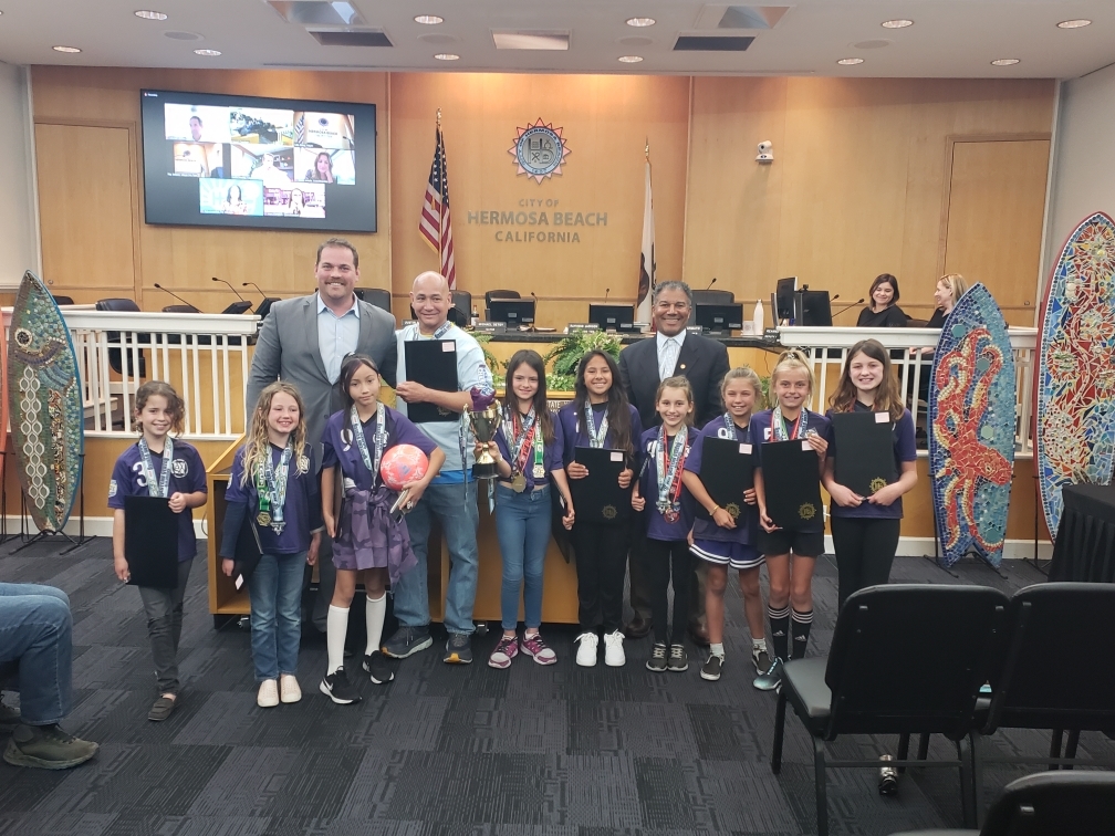 Group photo of children members of AYSO Purple Panthers Team