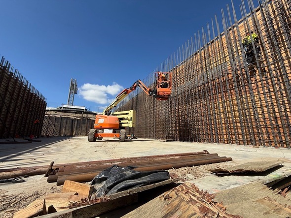construction site with reinforcing steel and construction equipment