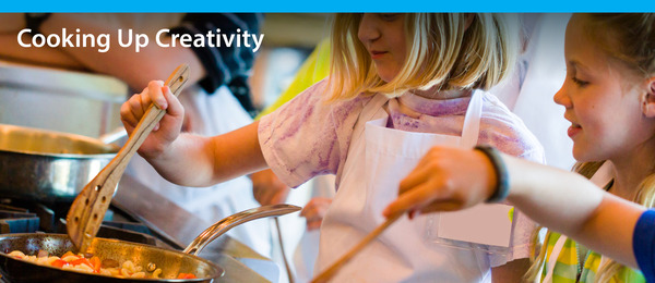 children learning to cook food