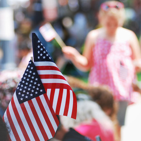 small flags and people celebrating 4th of july