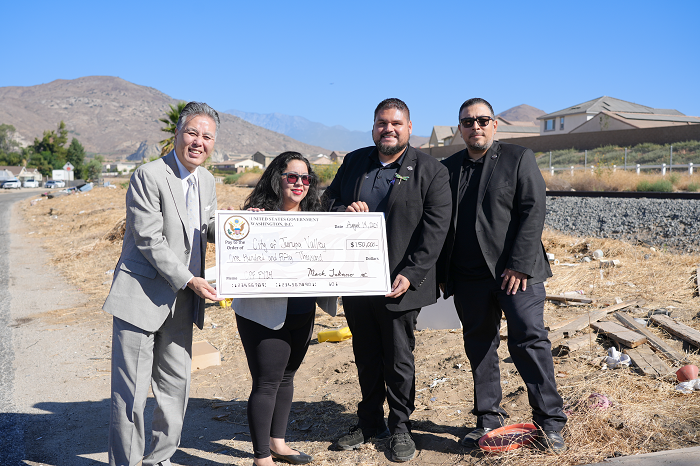 Takano presents ceremonial check to City Councilmembers