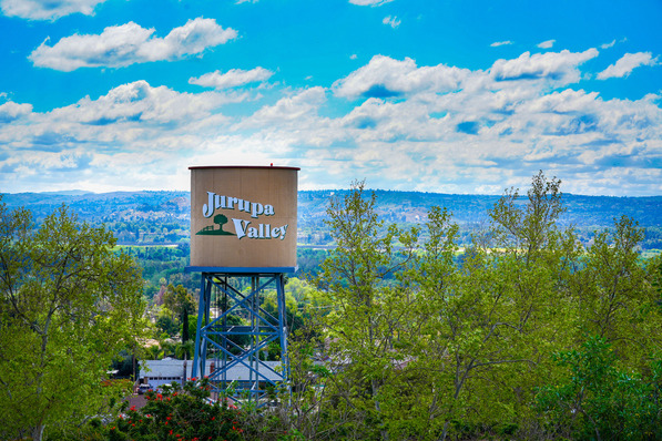 City water tower blue skies 