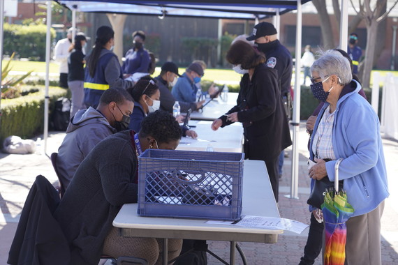 An elderly community member in line for the COVID-19 vaccine in the City of Bell. 