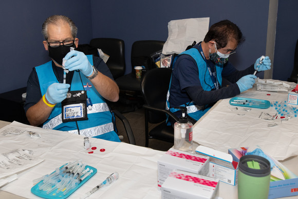 Administrators prepare vaccines