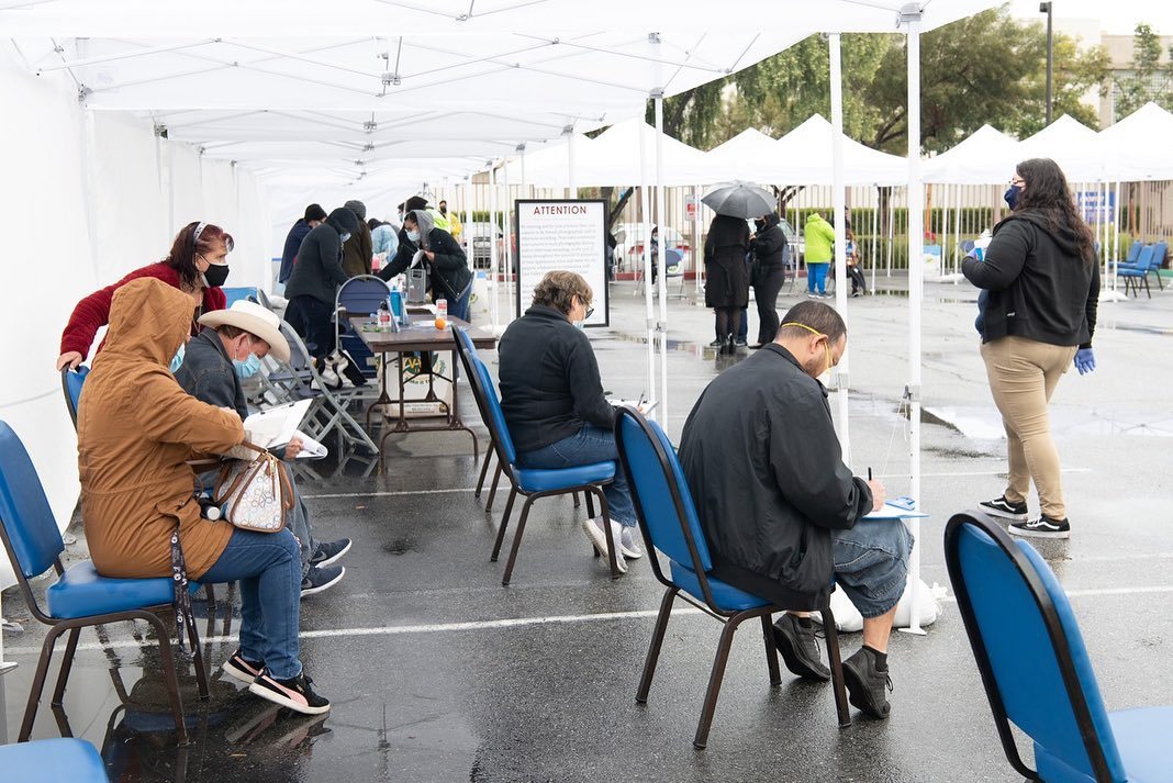 A group of residents await their turn for a COVID vaccine.
