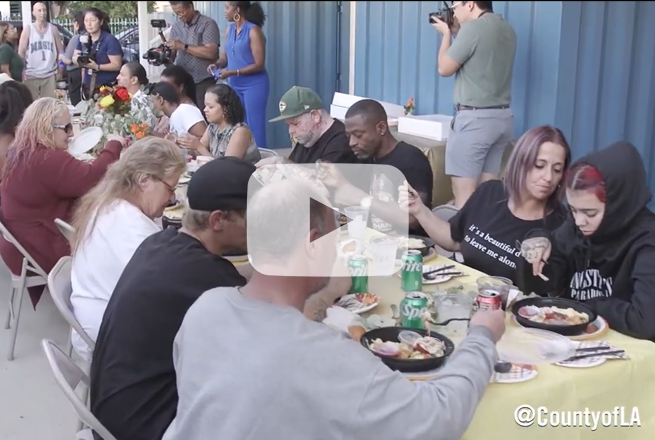 Pathway Home participants enjoy a Thanksgiving meal at their new home