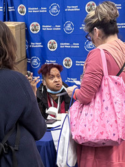 Commissioner McClain interacting with visitors