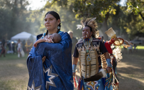 Chumash Tribe member carries her two-week-old baby at William S. Hart Park in Newhall