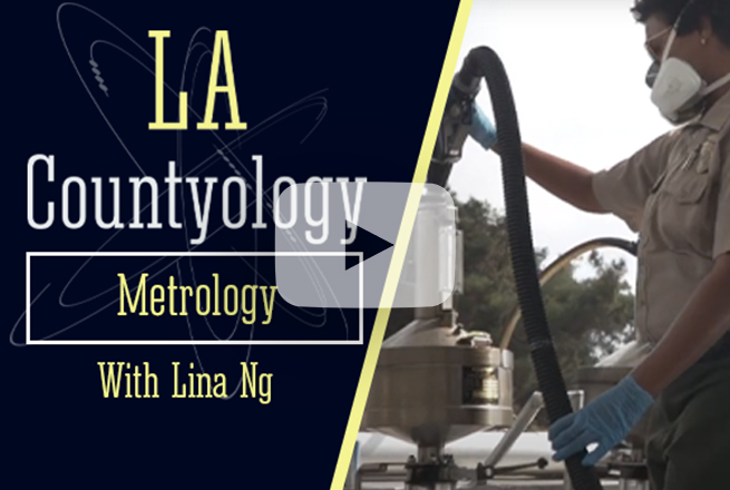 LA Countyology Metrology with Lina Ng next to a photo of an inspector ensuring measuring the volume at a gas pump.