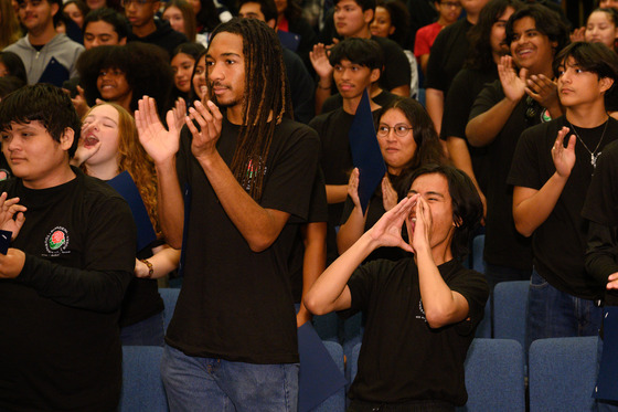 Students of 605 All Star Band cheer on their band director 