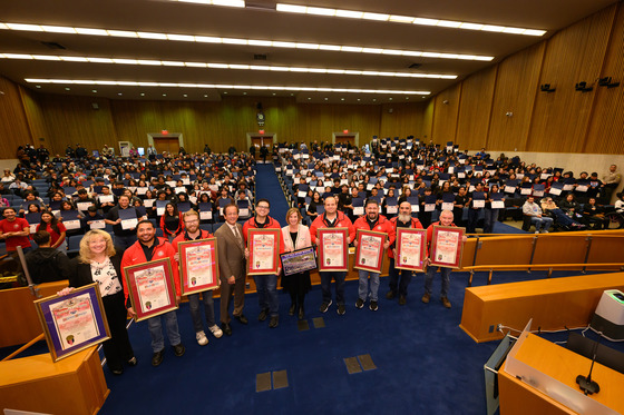 Hahn presents all 8 605 All Star Band directors with county scrolls 