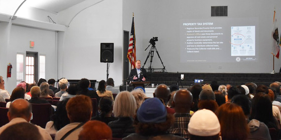 homeowners fair Assessor Prang speaks to audience