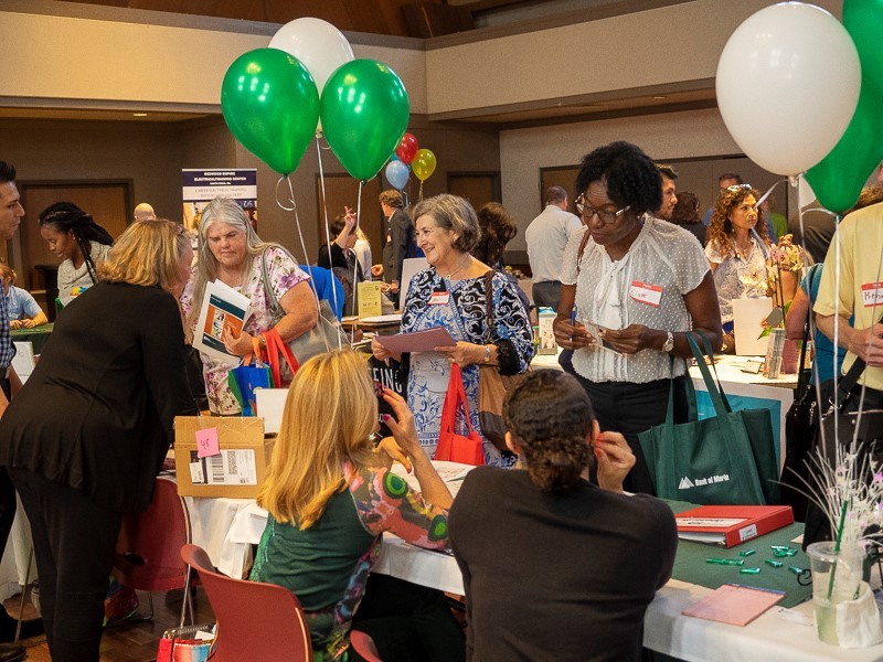 People mingle at a job fair