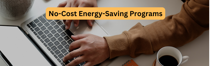 Image of person working on a laptop with text "No-cost energy-saving programs"