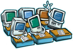 A group of computers with arms and hands sitting in classroom desks.  One of them has its hand raised to ask a question.