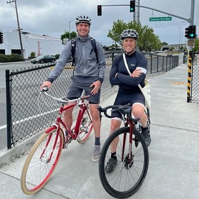 Supervisor Lucan and Derek Johnson riding bikes on Bike to Wherever Day.