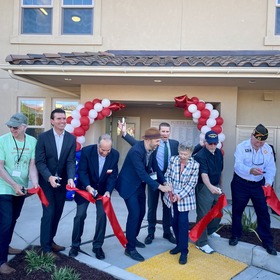 Group Photo of ribbon cutting of new veterans housing project