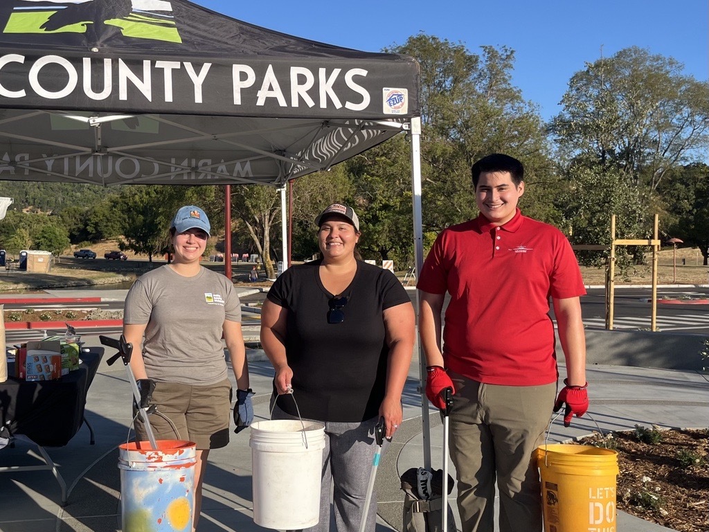 District 1 Aides and Career Explorer Intern in front of County Parks tent