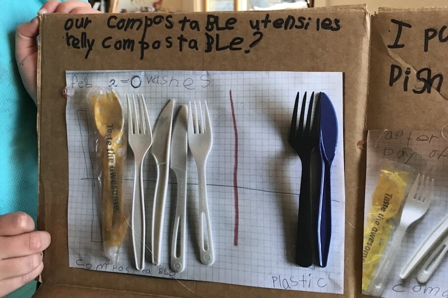 cardboard with disposable utensils displayed