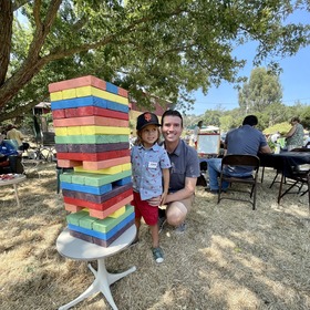 Supervisor Lucan and his son, Noah, at a summer picnic