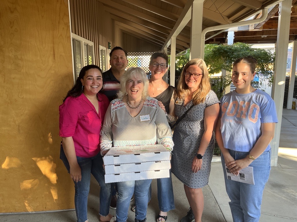 group smiling toward camera 