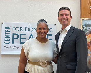 Eric Lucan with Tara Peterson, Executive Director of the Center for Domestic Peace. 