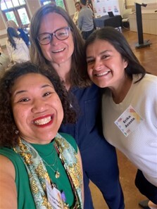 selfie with big smiles toward camera