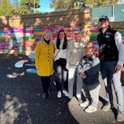 Eric with community members touring a Magical Bridge Playground