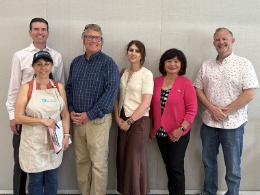 Supervisor Lucan and attendees of congregate meal lunch 