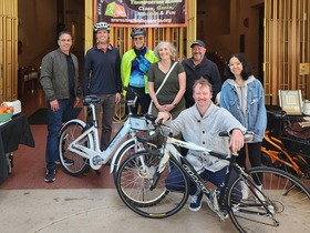 Group of cyclists with Supervisor Lucan in front of Marin County Civic Center