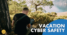 A person sits outdoors using a laptop. Text reads: "Vacation Cyber Safety."