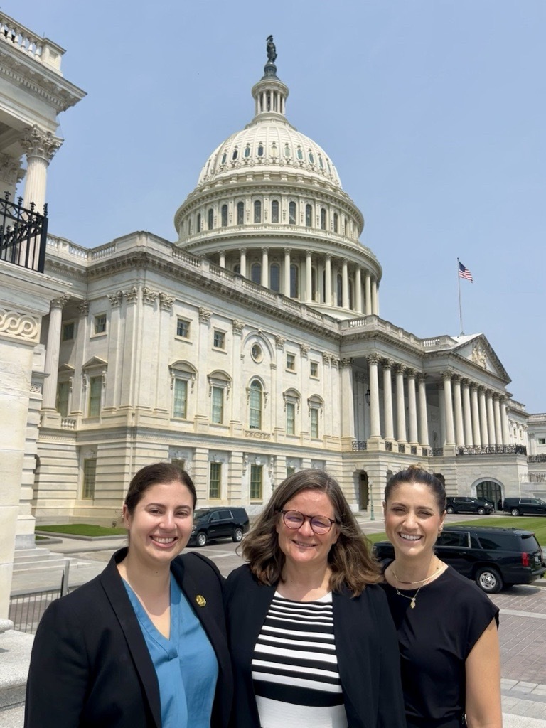 Mary, Julia, and Talia standing on steps of US Capitol