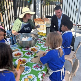 Supervisor Lucan with Kids in Garden
