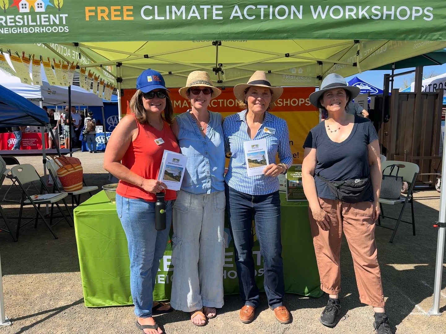 Mary and Stephanie smile with Resilient Neighborhoods Executive Director and volunteer at Emberstomp