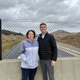 Eric Lucan and TAM Executive Director Anne Richman on an overpass over Highway 101
