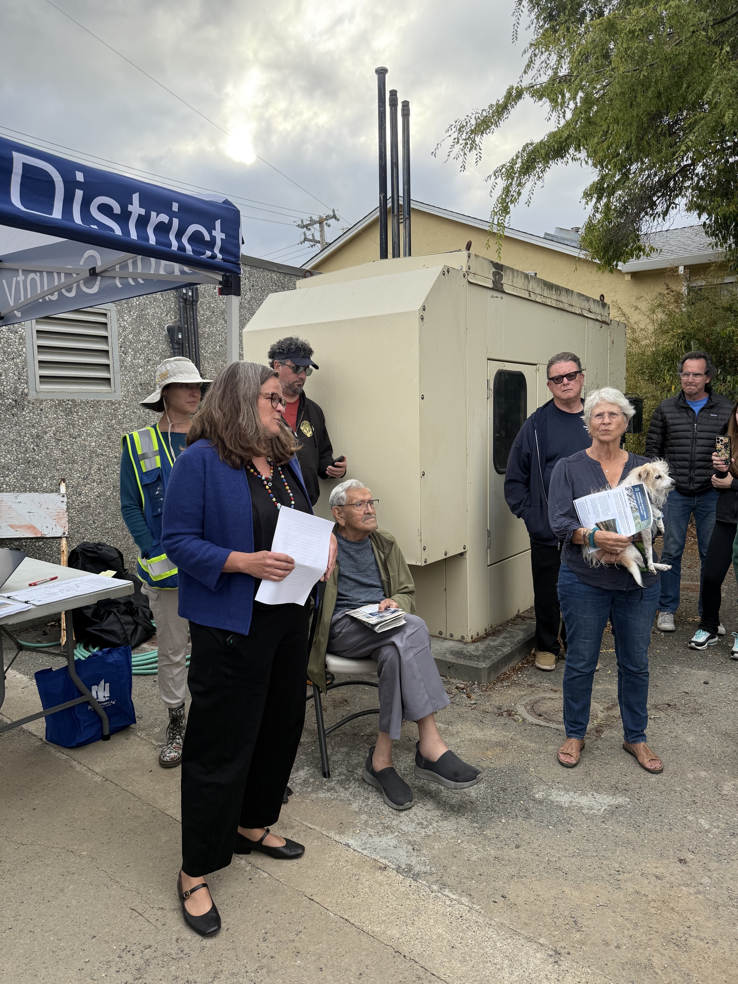 Mary talking with neighbors in Santa Venetia