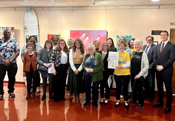 Group photo of Friends of the Marin County Libraries, library staff and Marin County Supervisors.