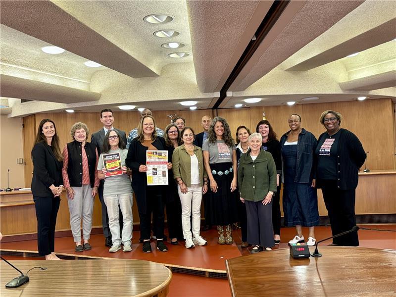Board and Library Staff and allies holding Banned Books resolution in chambers